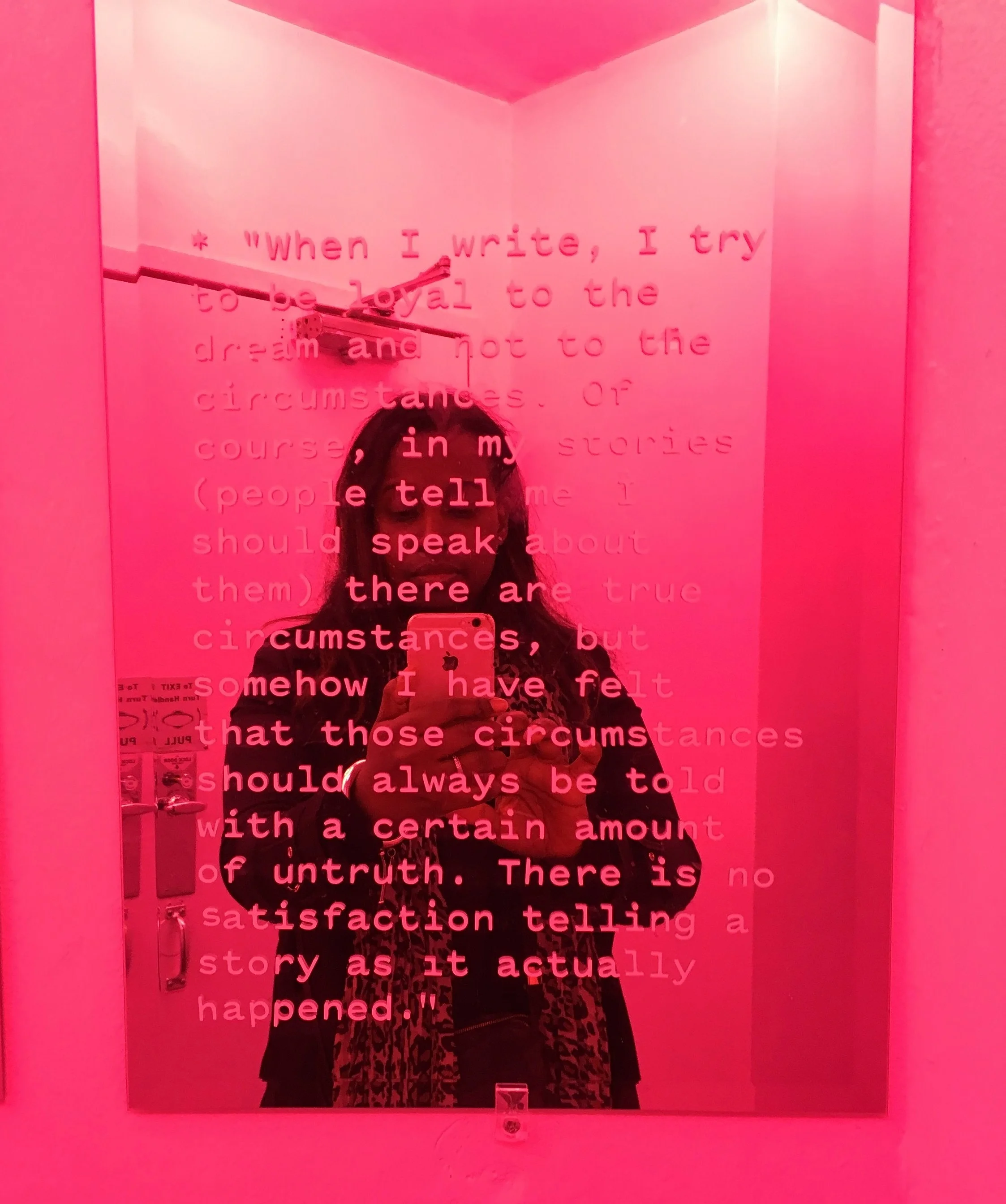 Me reading poetry on mirrors, in the pink bathroom of McNally Jackson bookstore in Manhattan, NYC. - I love this one x