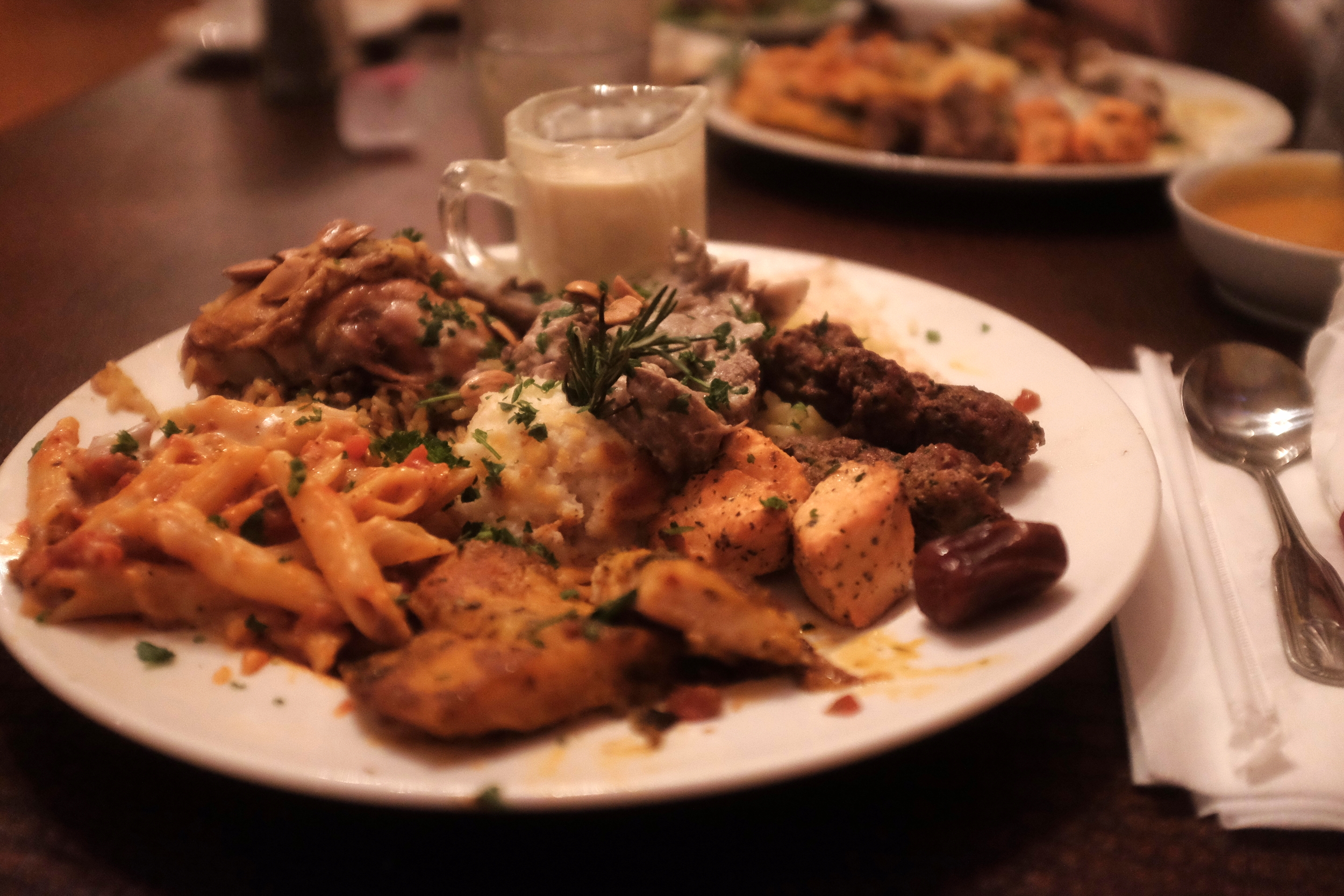 And what a feast it is: Maklouba, Mansaf, Potatoes, Pasta, Kofta, Kebab, and fish!