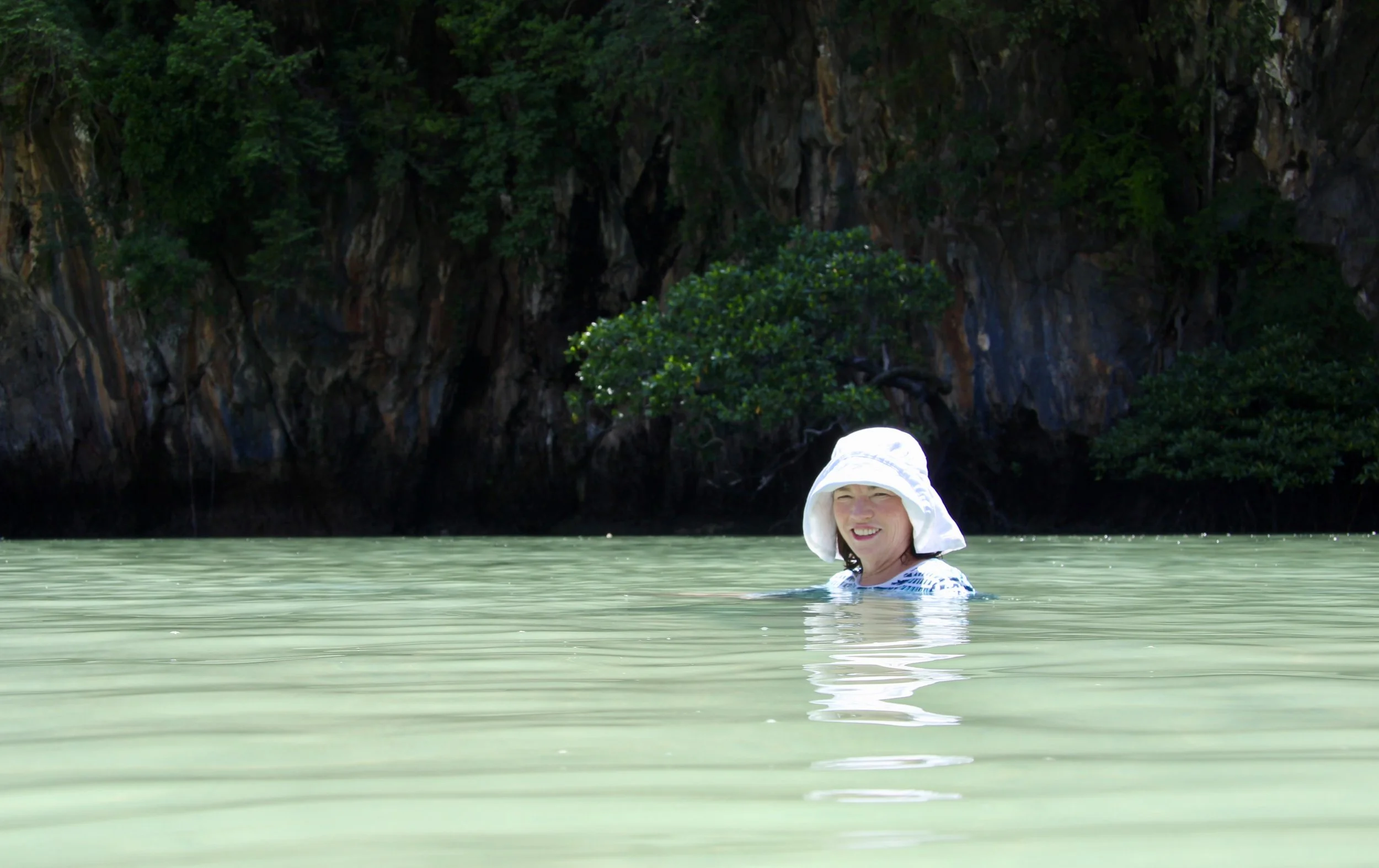 Nu from ANI (left) showing off a star fish and my mom sitting in the bay.