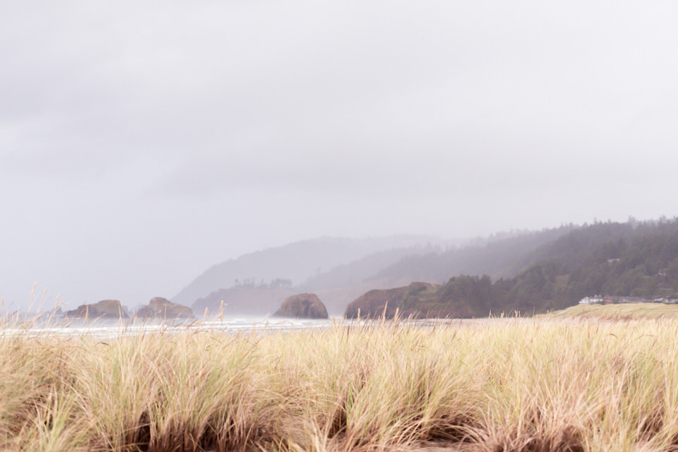 Cannon Beach Haystack Rock at sunrise hazy rainy engagement session-17.jpg