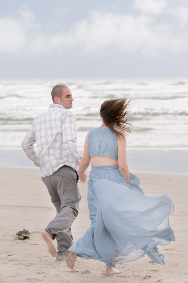 Couple running on the beach