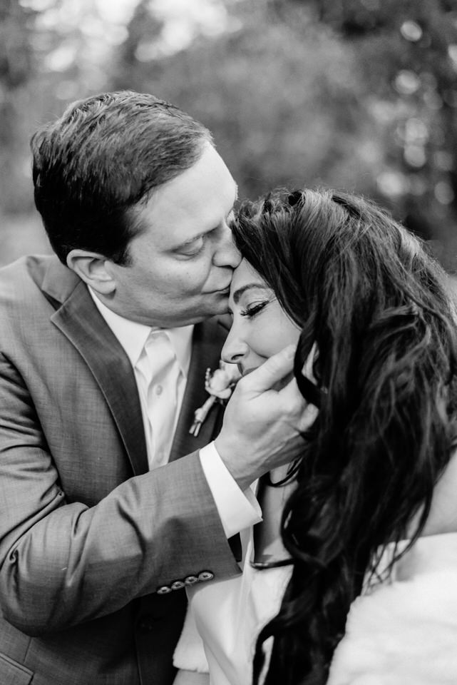 Groom kissing bride on forehead romantic Seattle wedding CServinPhotographs-1.jpg