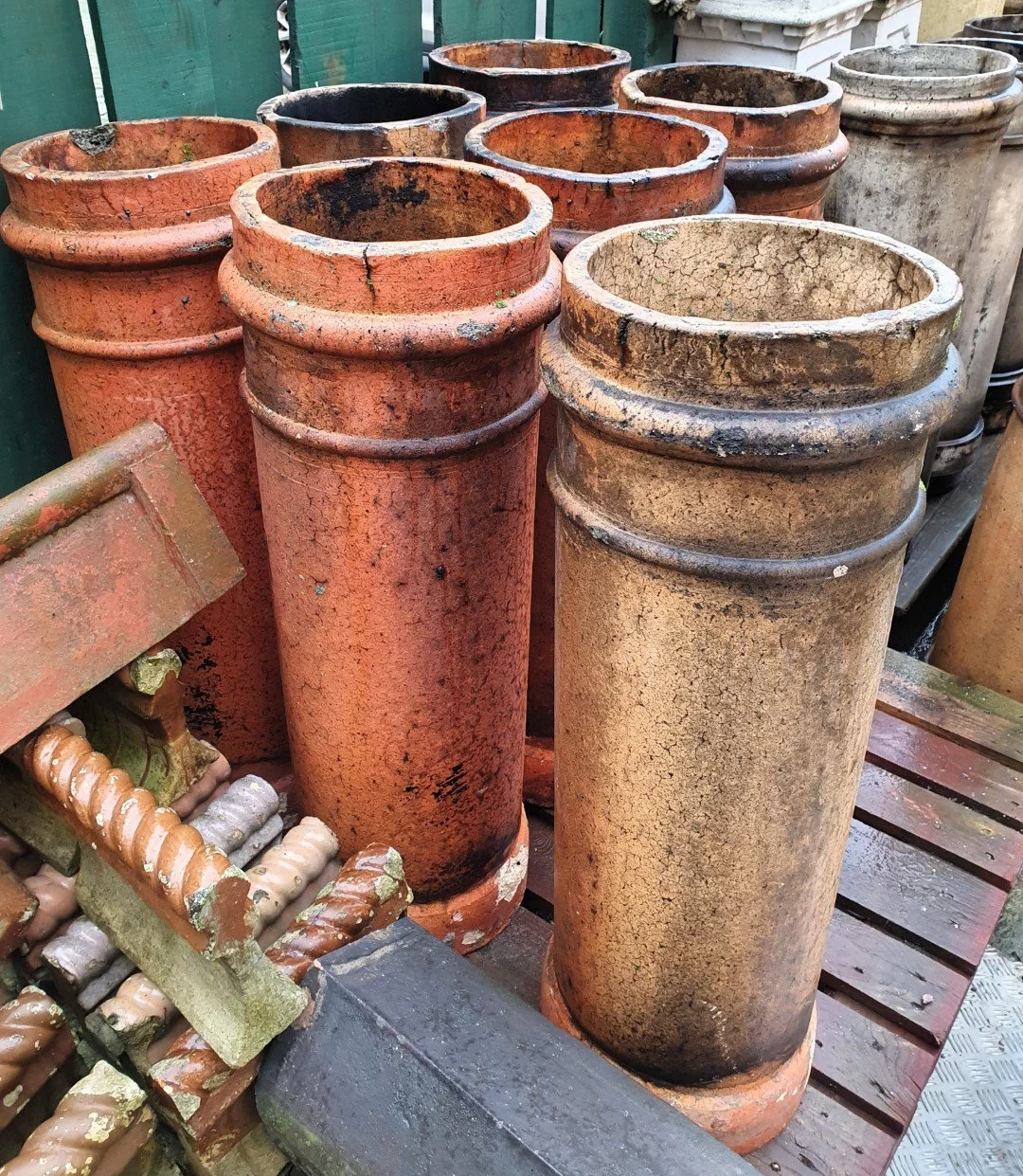Round clay chimney pots reclaimed by Holyrood Architectural Salvage in Edinburgh.
