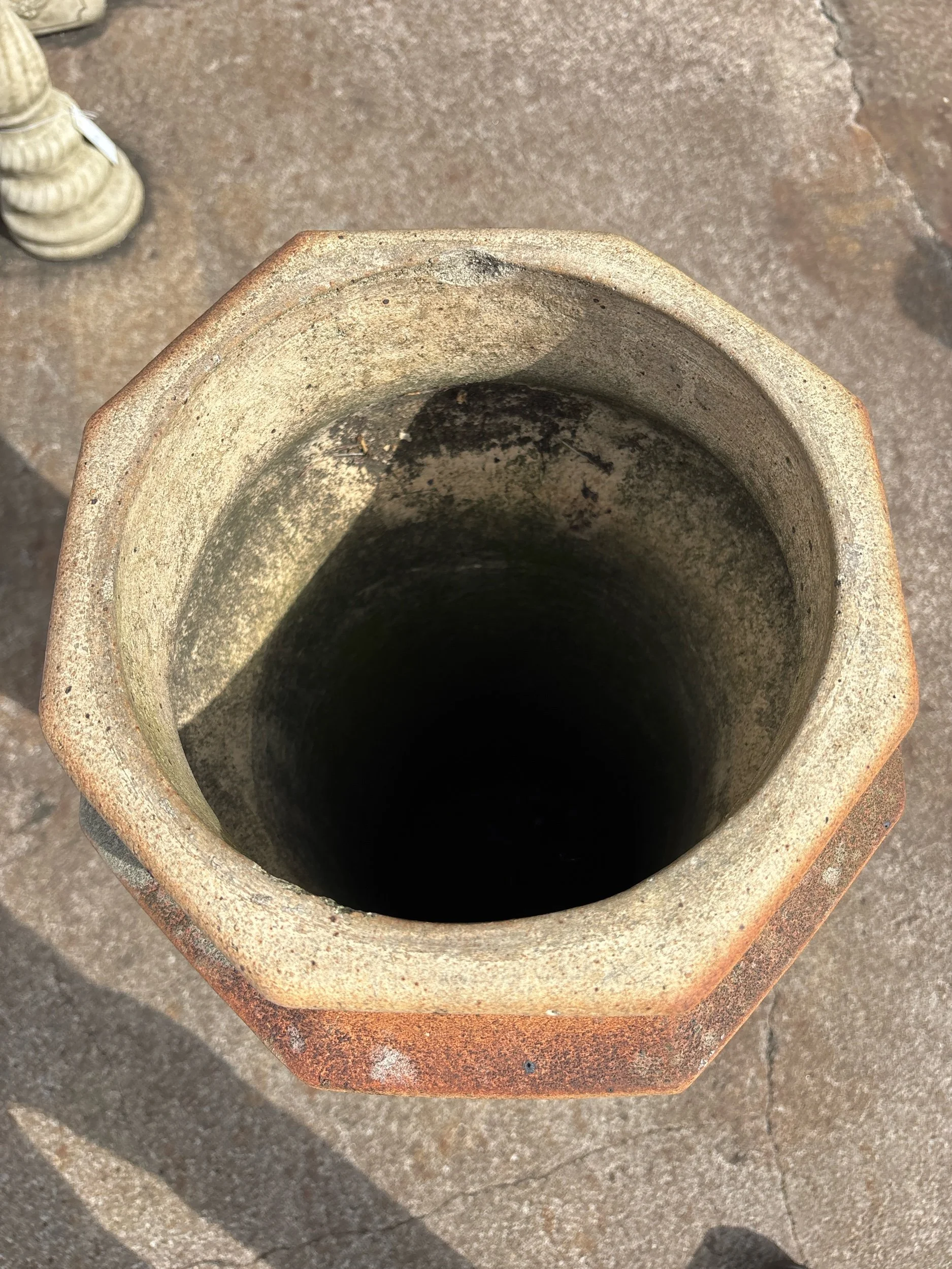 Victorian square base chimney pot with tapered sides and original weathered terracotta surface