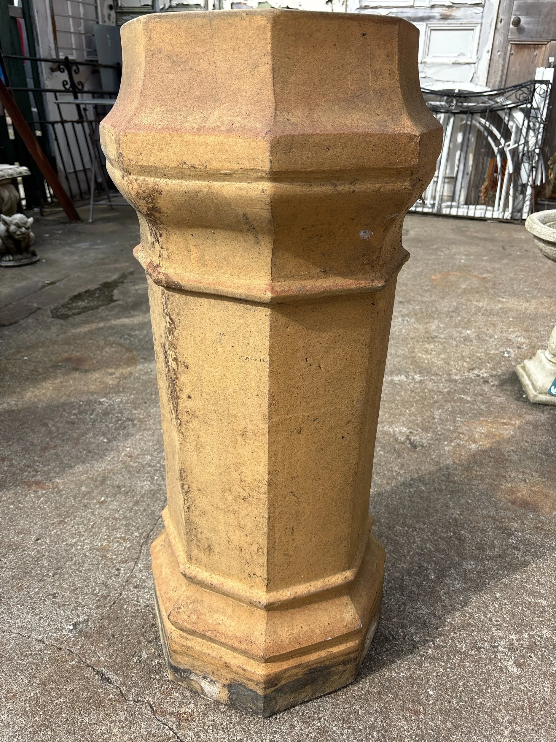 Rare octagonal chimney pot with moulded detailing and natural moss patina, reclaimed for reuse
