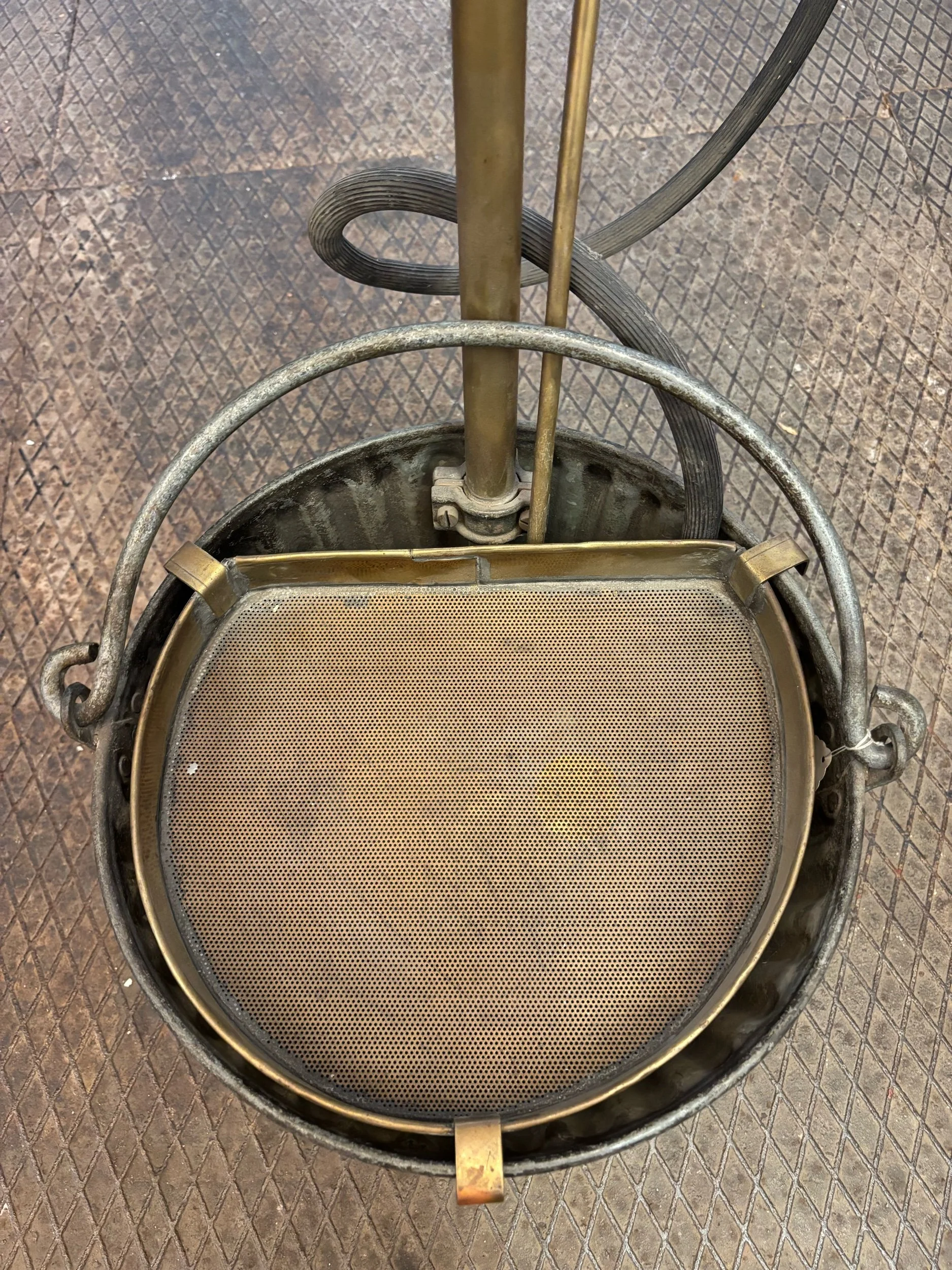 antique fire extinguisher, brass fire pump, fire brigade history.