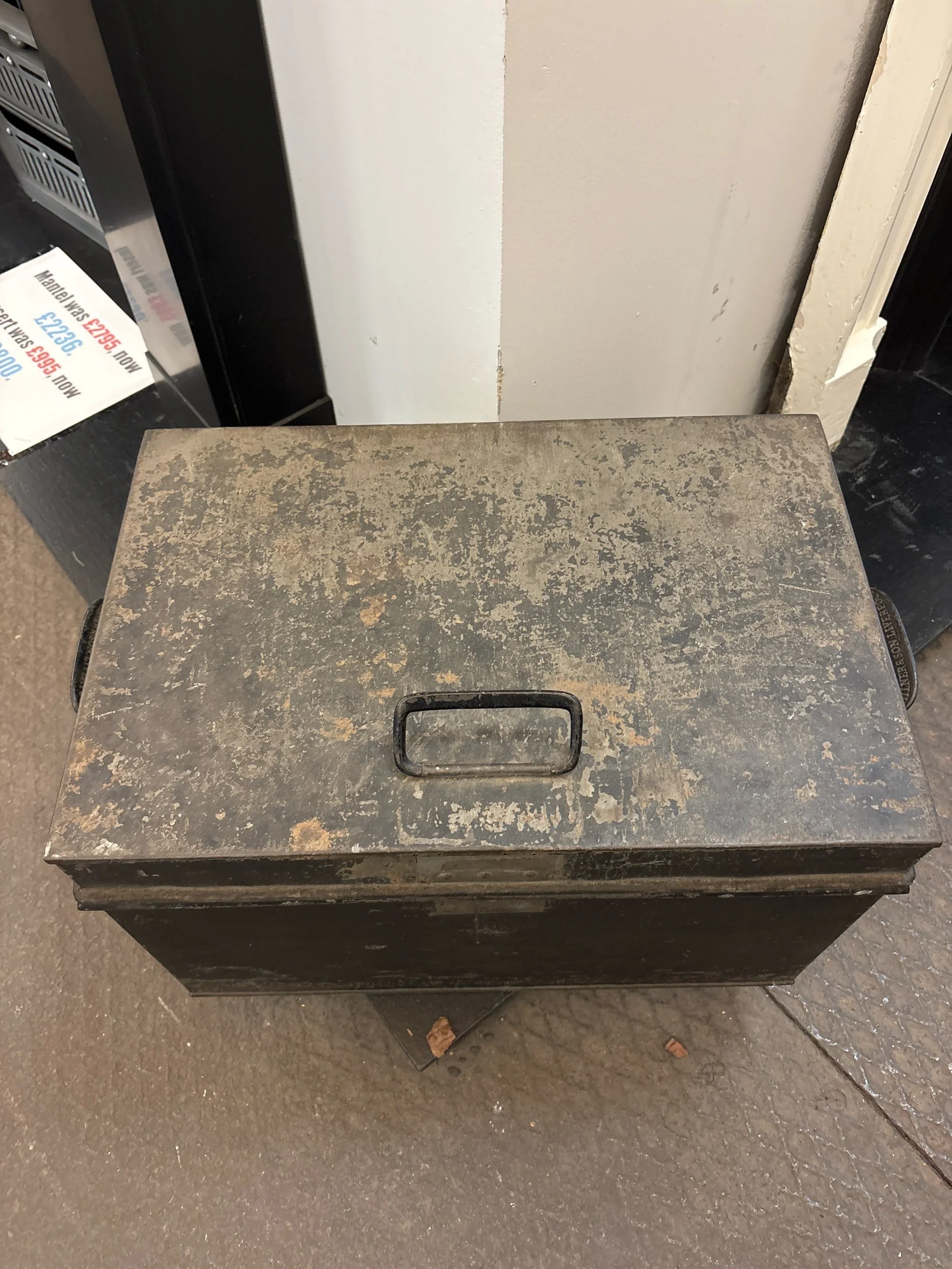 Antique fireproof safe with key made by Milner's.