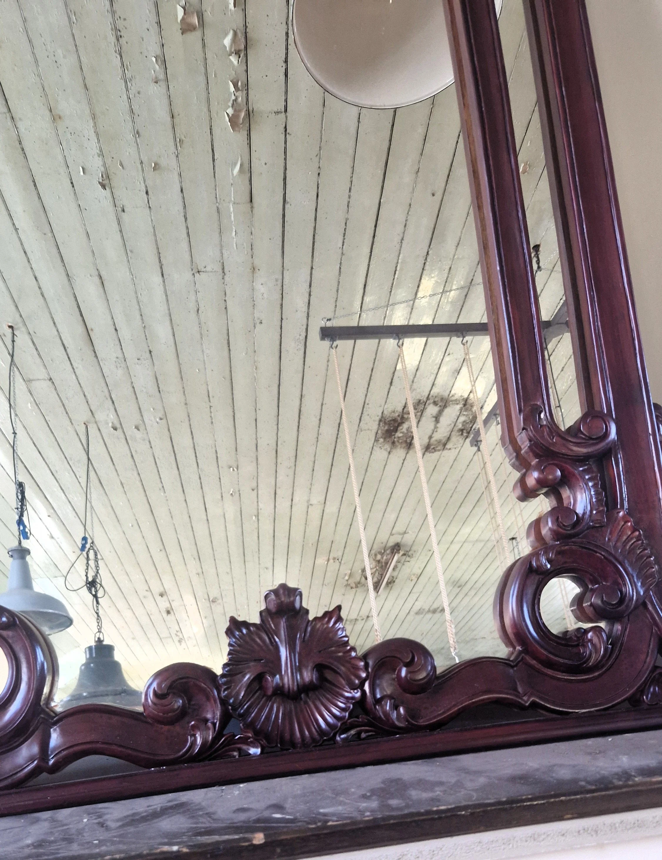 Ornate rococo-style mirror from Holyrood salvage in Edinburgh