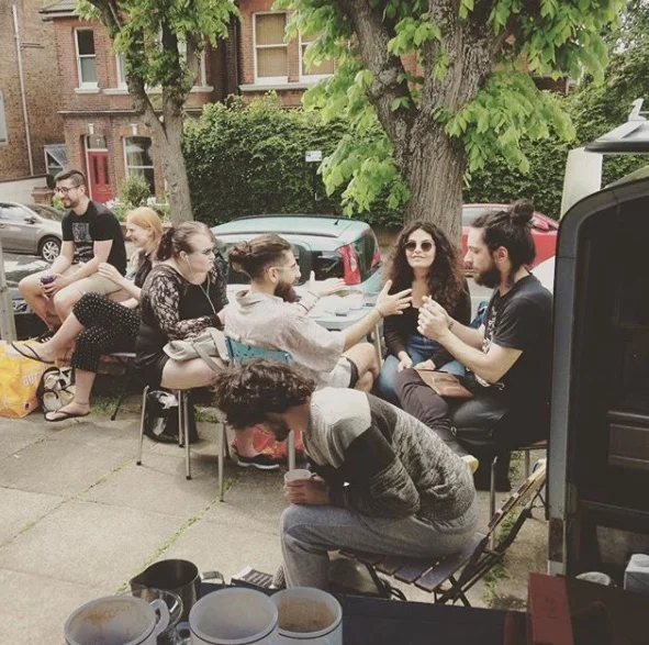 The Florence Road Market coffee scene, in shorts weather.