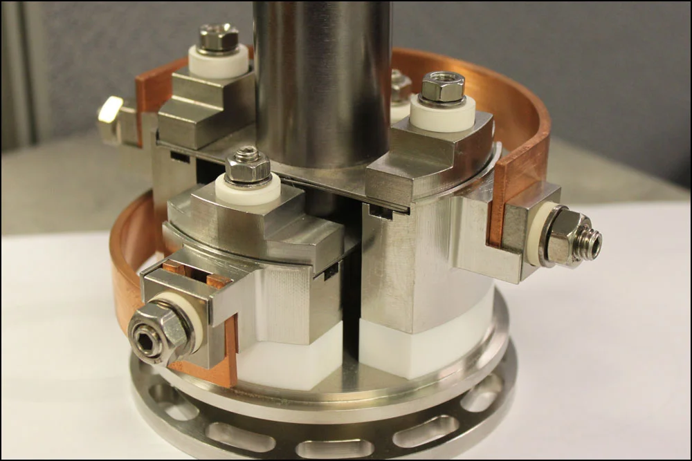 A Resistance Source Heater, fabricated and assembled in house from Tantalum, Stainless Steel, and Copper.