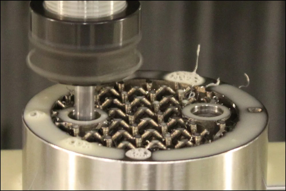 Hybrid Manufacturing - Precision machining SAE threads after 3D printing, thermal conditioning, and precision turning. Inconel component with lattice core.