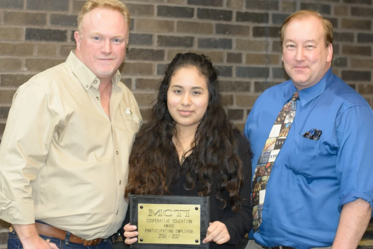 Imperial's Director of Operations Mike Clifford (left) and student Karen Gomez (center) at the 2017 MCTI Co-op Awards Dinner
