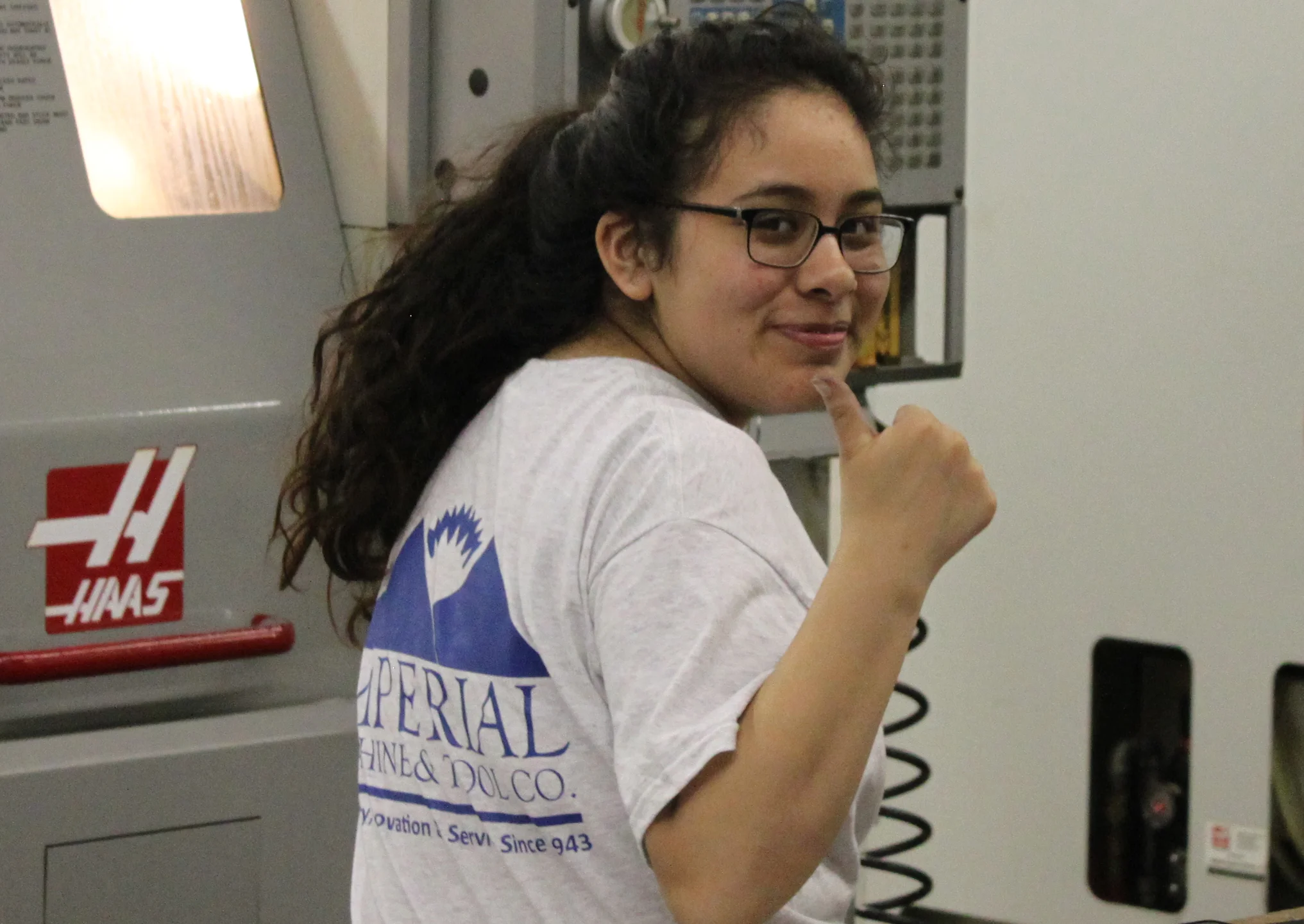 Karen working on her Haas CNC machining center