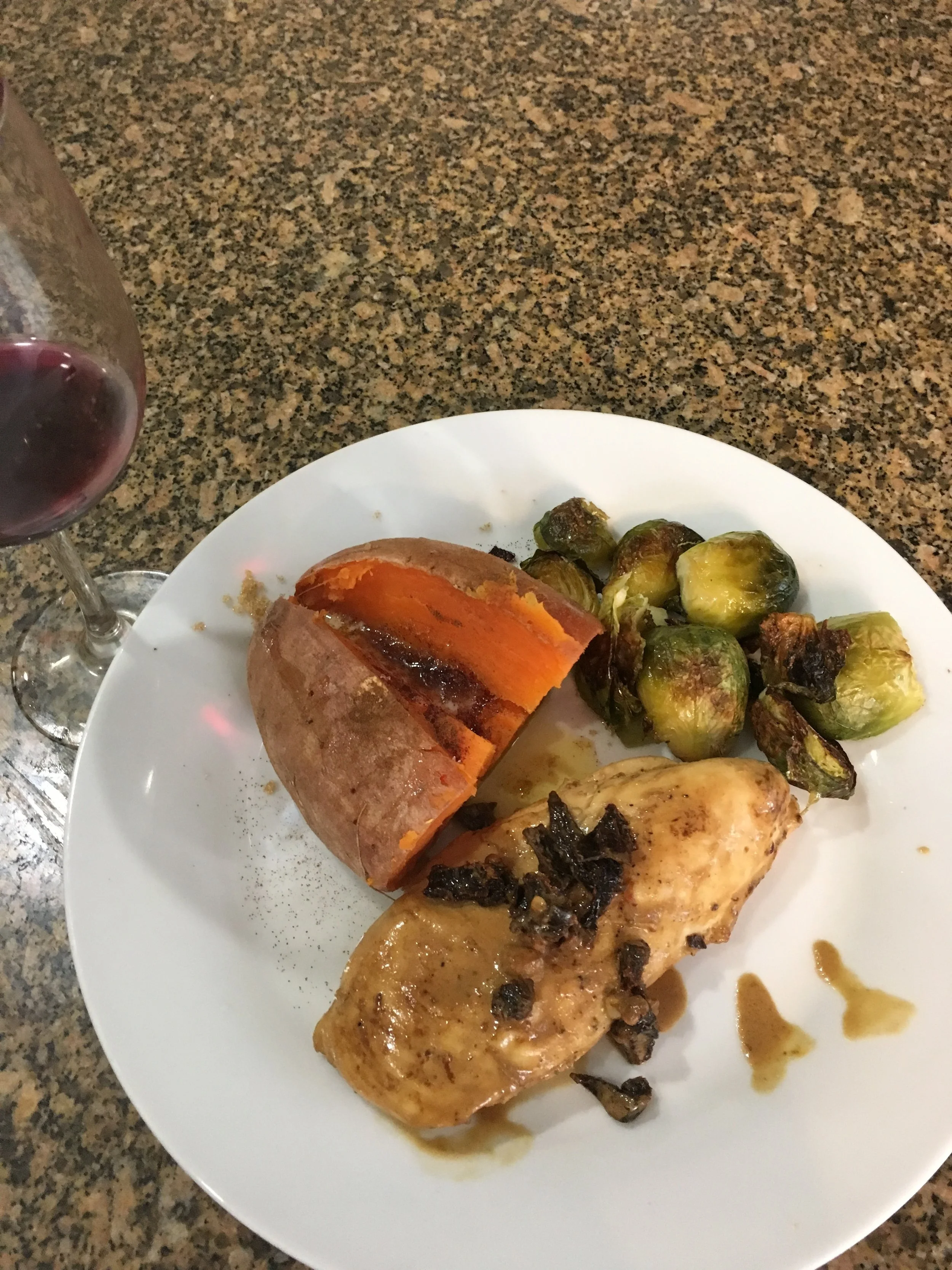 Tonights meal. Sundried tomato chicken, parmesan brussel sprouts and sweet potatoes. 