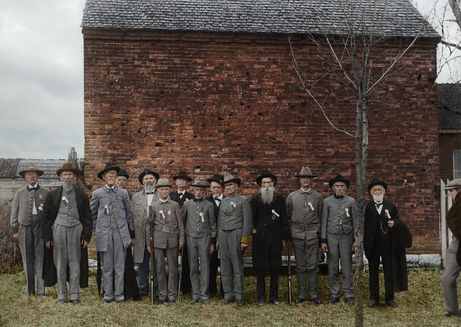 The 50th anniversary of the Battle of Franklin was held in 1914 as a Blue and Gray Reunion; US and Confederate soldiers walked the ground together and remembered the events of the Battle of Franklin. The photo, taken in front of the Carter House smo…