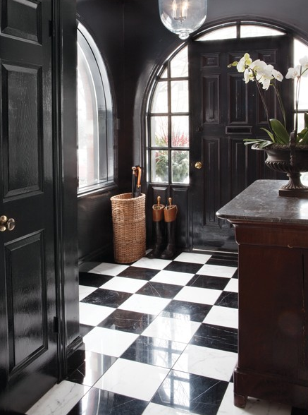 The inspiration...gloss black paint on the walls, doors and trim, along with black and white marble tiles creates extra drama in this super classy entryway. Image via This Ivy House