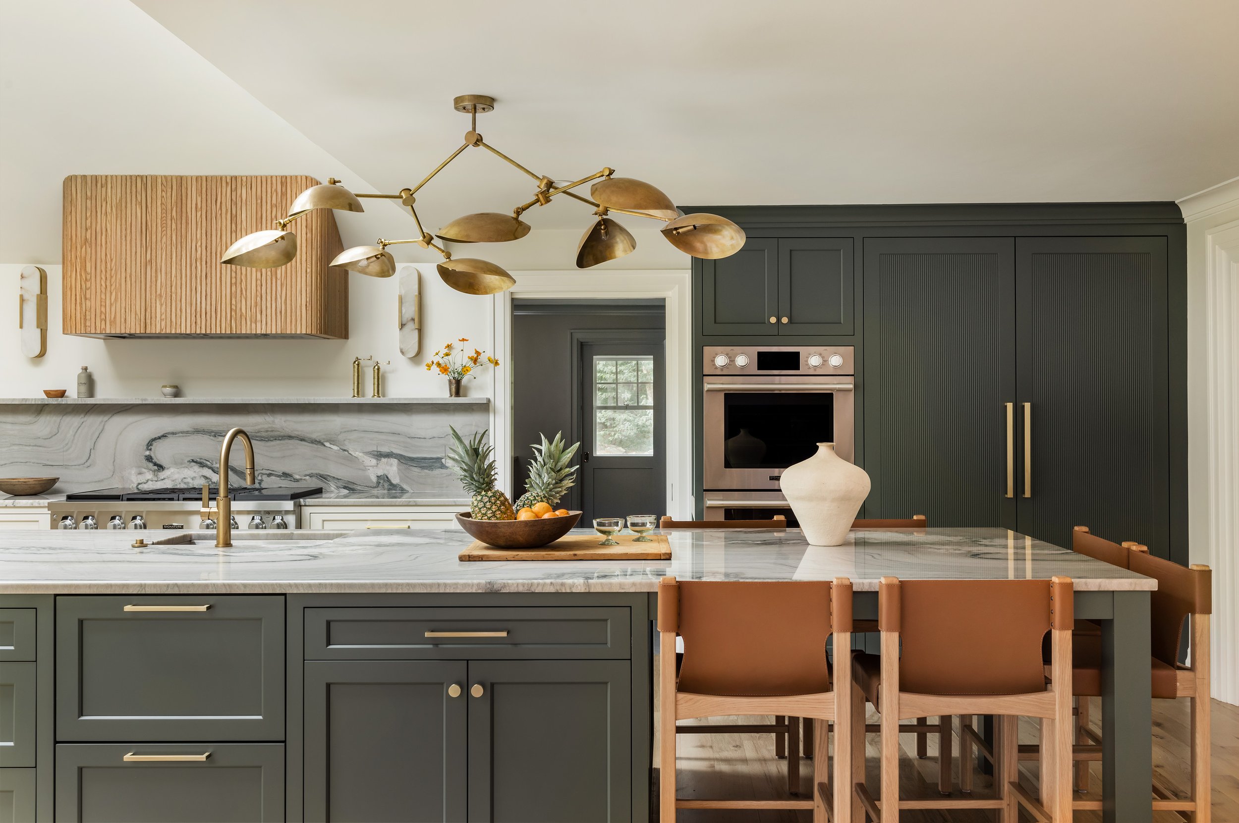 WESTON EXPANSION

 

 An addition and complete overhaul in Weston, this home was determined to make the absolute most out of the existing shell and its surroundings. A vaulted family room, unique lighting, and special attention to every family member