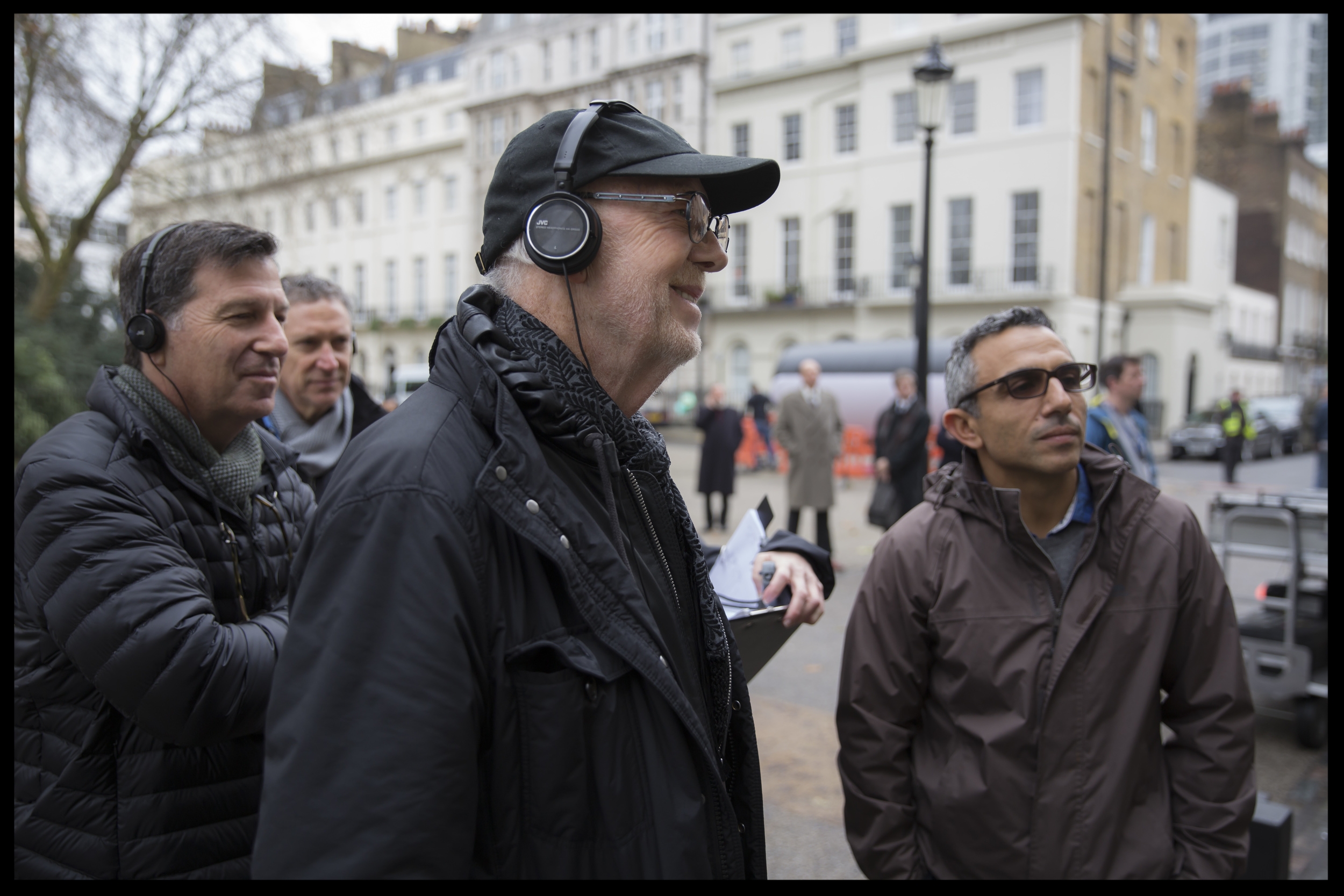 (l to r) Producer Gary Foster , Director Mick Jackson and Director of Photography Haris Zambarloukos review a take on the set of their film DENIAL , a Bleecker Street release. Credit: Laurie Sparham / Bleecker Street