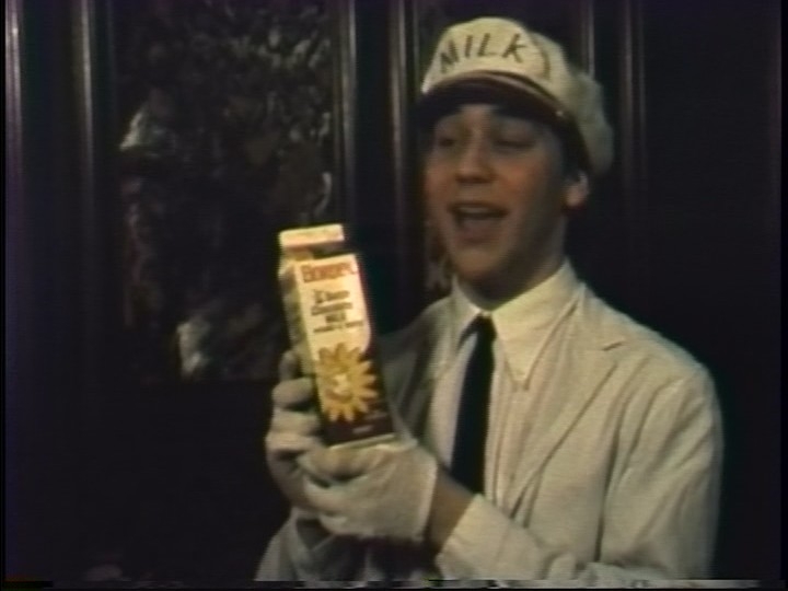 A young Sam Raimi in Attack of the Helping Hand the short that would directly influence the now legendary hand sequence in Evil Dead 2 , co-written by Scott Spiegel .