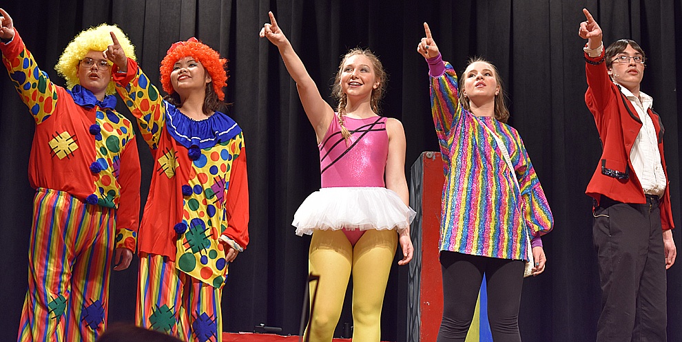 The Circus crew led by Ringmaster Amos Calloway (Connor Canell-right).