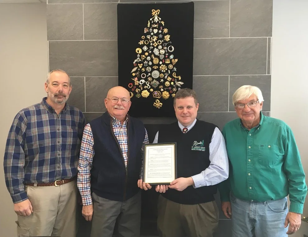 Gouverneur Area Development Corp presenting a resolution of commendation to Patrick Kelly, Executive Director of St Lawrence County IDA. The resolution was given to the IDA in appreciation of their work in the opening of the Empire Mines. From left: Dave Spilman, Gouverneur Town Supervisor, Alex MacKinnon, President GDAC, Patrick Kelly, Executive Director SLCIDA, Ron McDougall, Mayor Village of Gouverneur. (photo provided)