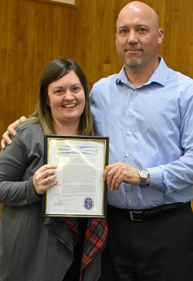   Barbara Gauthier (left) proudly holds her Staff Recognition Award received for her dedication to the Gouverneur School District. GCS Board of Education President David Fenlong (right) helps in this recognition. (photo by Jessyca Cardinell)  