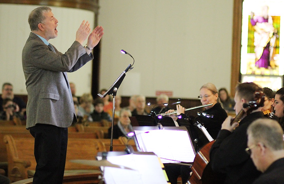   Dr. Donald Schuessler, Jr. conducting the Gouverneur Community Chorus and instrumentalists performing “The Song Everlasting” by Joseph M. Martin on Sunday, April 14 at the First United Methodist Church of Gouverneur. (Rachel Hunter photo)  