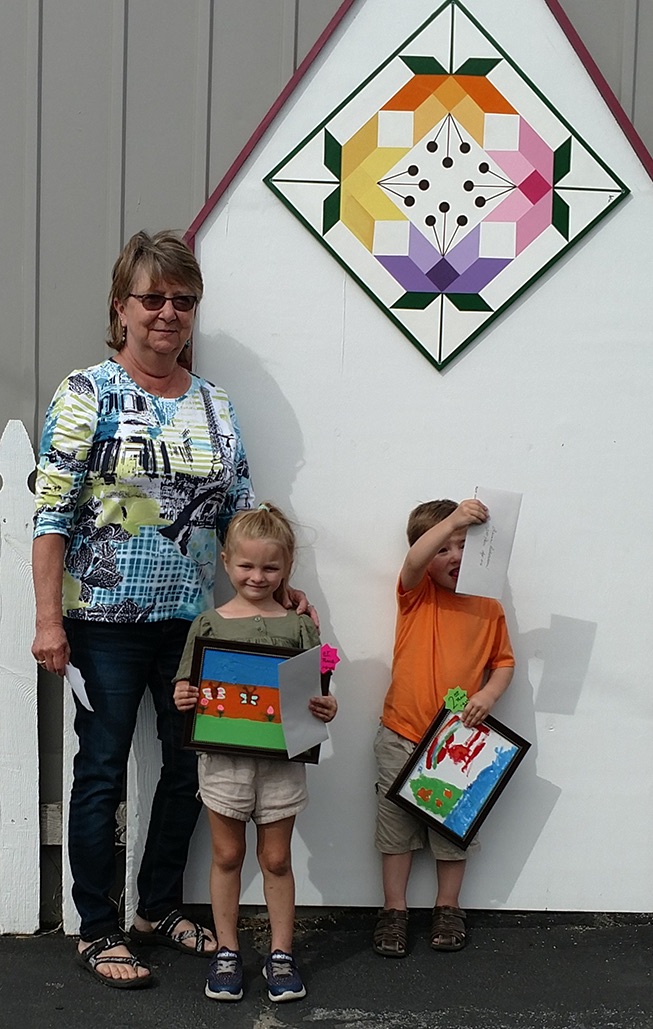   Artsy Contest Judge Donna Thorpe of Fowler with 0-6 age category winners Keelee Bice and Quinn Richardson. (photo provided)  