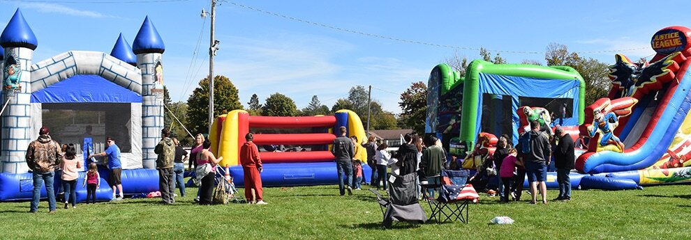   The bounce houses at the 8th Annual Gouverneur Pumpkin Festival brought droves of youngsters in participating in the great fun. (photo by Jessyca Cardinell)  