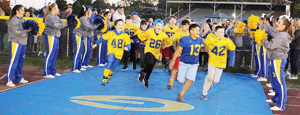   Gouverneur Pee Wee Football players were invited to lead the Gouverneur Wildcat Varsity Football Team onto the Frank LaFalce Field on Friday, October 11. The youth were inspired to develop their athletic skills during their talks with the varsity f
