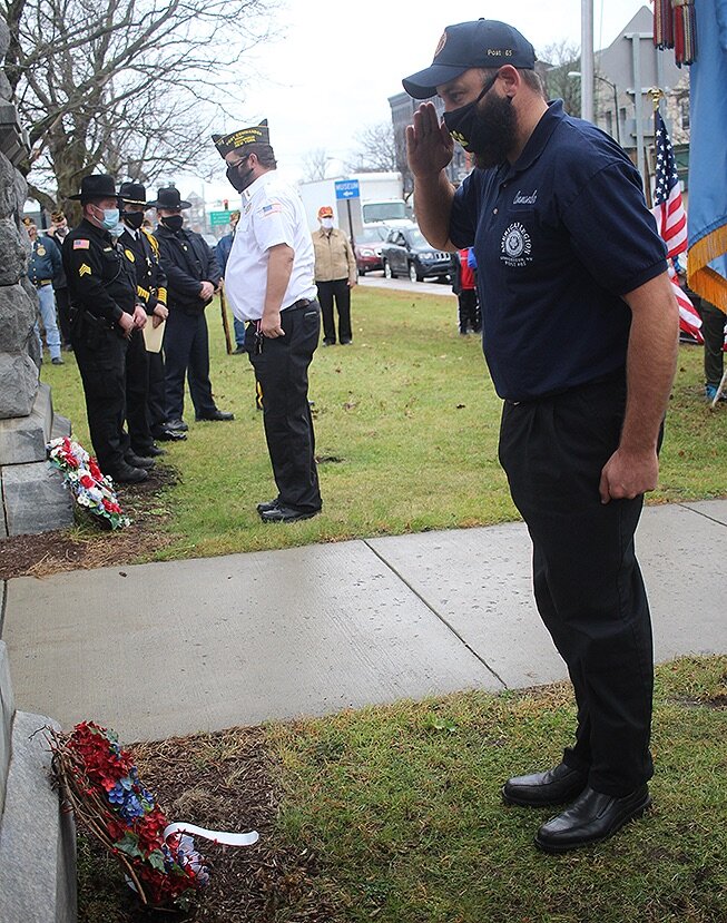    Gouverneur American Legion Post Commander Jason Carvel and VFW Post 6338 Commander John Holt presenting the ceremonial wreaths during the Gouverneur Veterans Day Ceremony on behalf on the posts. (Rachel Hunter photo)  