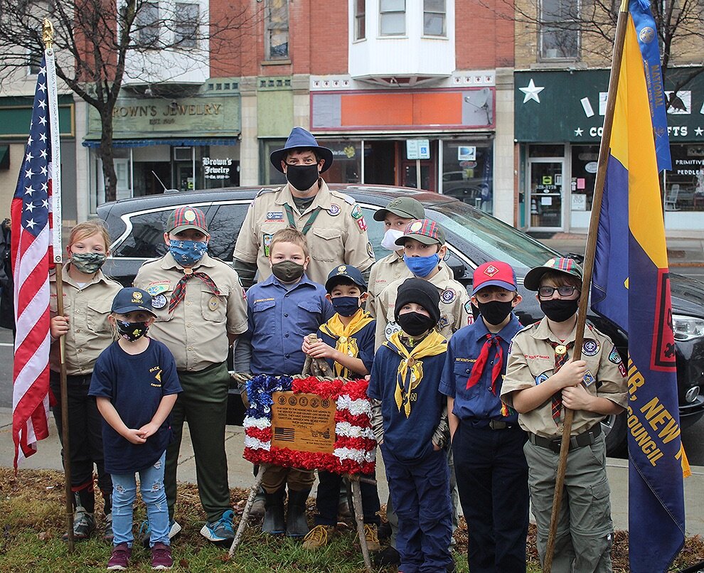    Gouverneur Cub Scout Pack No. 2035 stands behind the plaque they presented at the Gouverneur Veterans Day ceremony on Nov. 11. Cubmaster Chris Gates pictured along with scouts Gregory “Junior” Haines, Koryn Berti, Nathan Massey, Eliot Haines, Isaa