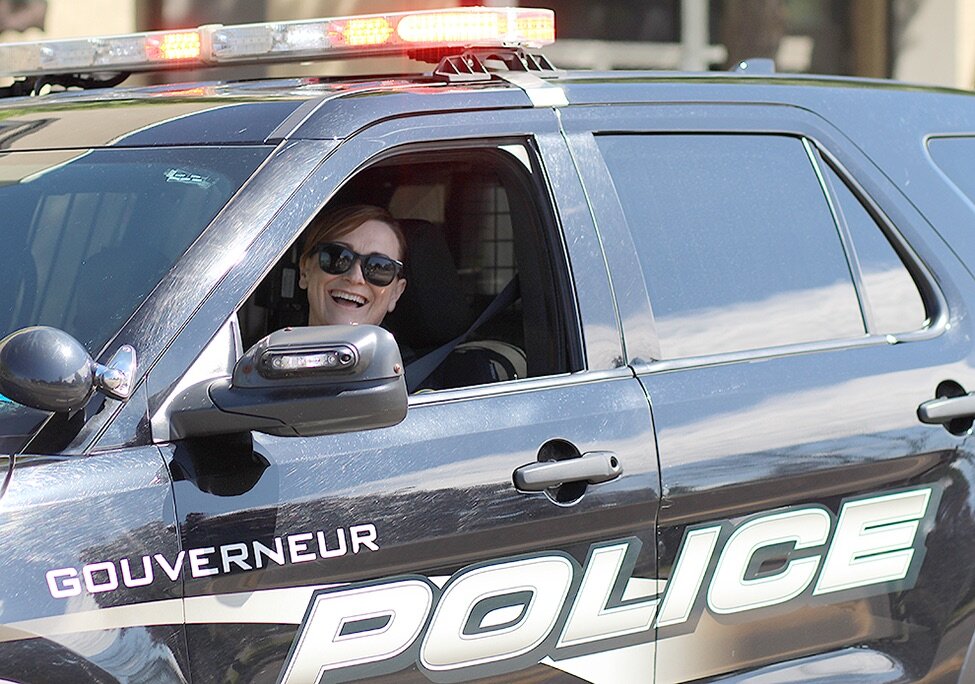    Village of Gouverneur Chief of Police Laurina Greenhill in a Gouverneur Police Department vehicle at the start of the parade. (Rachel Hunter photo)  