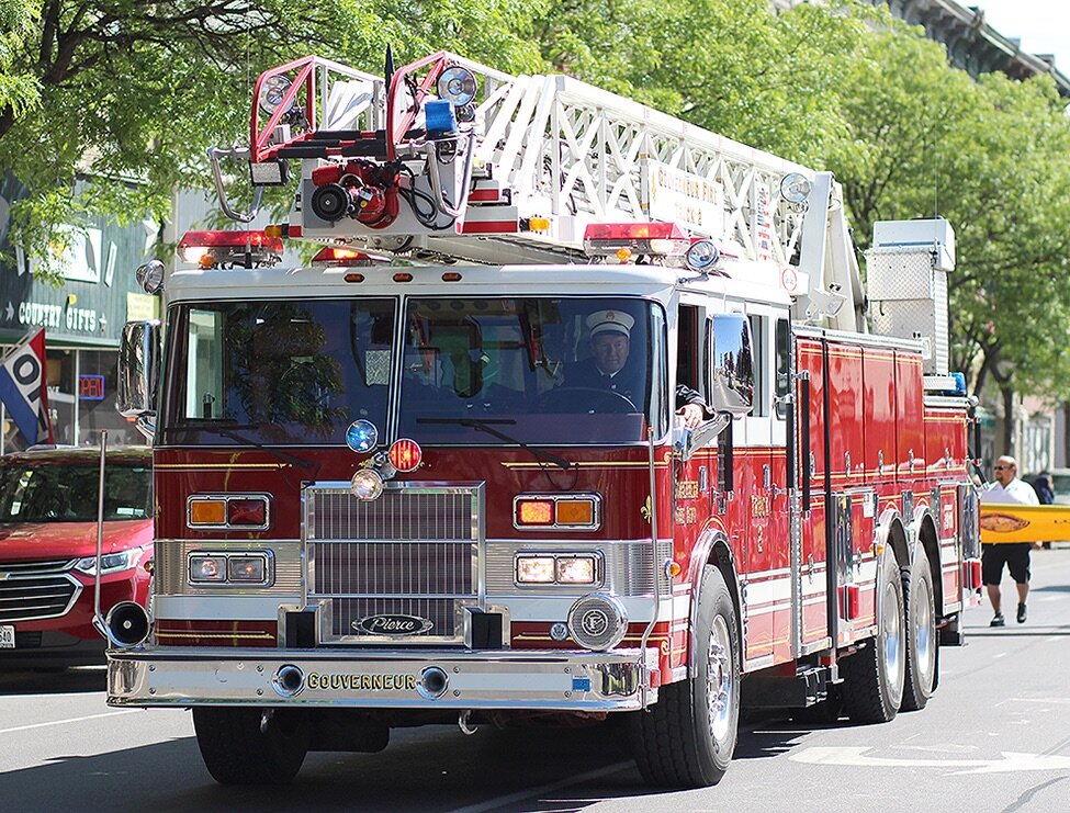    Gouverneur Fire Department’s Truck 2 ladder truck in the 2021 Gouverneur Memorial Day Parade. (Rachel Hunter photo)  
