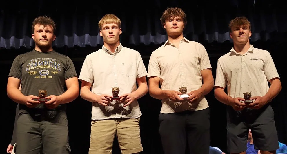   Wildcat Football Awards: Tristen McRobbie, Hayden Stowell, Carter Lumley, and James Minckler. (Rachel Hunter photo)  