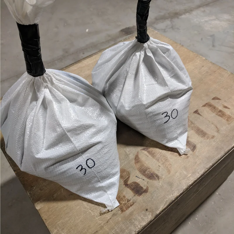 Men will use 2x 45# Bags and a 24" Box. Women 2x 30# Bags and a 20" Box.