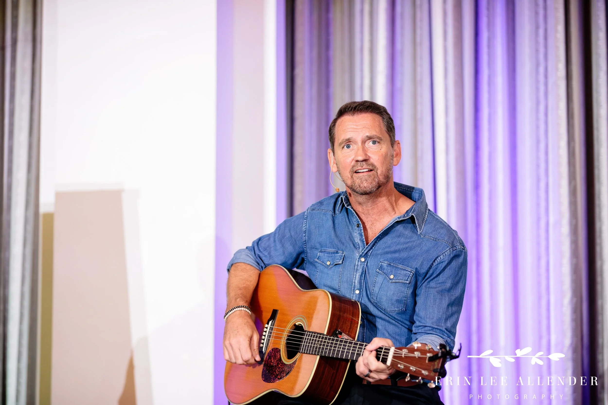 Nashville event photography — Jimmy Yeary performing with guitar during CBIZ Nashville Summit songwriting session