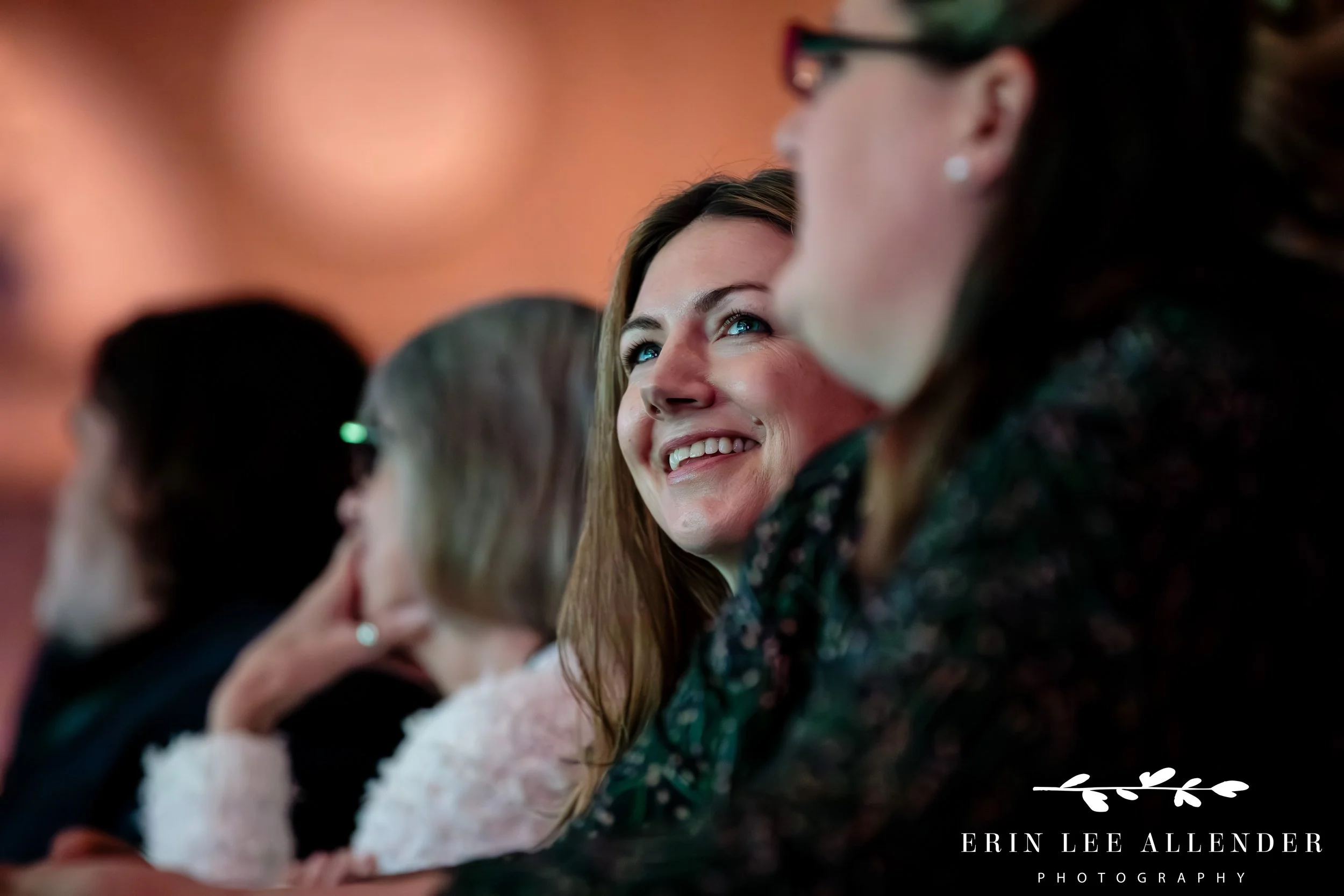 conference attendees laughing during session at opryland hotel