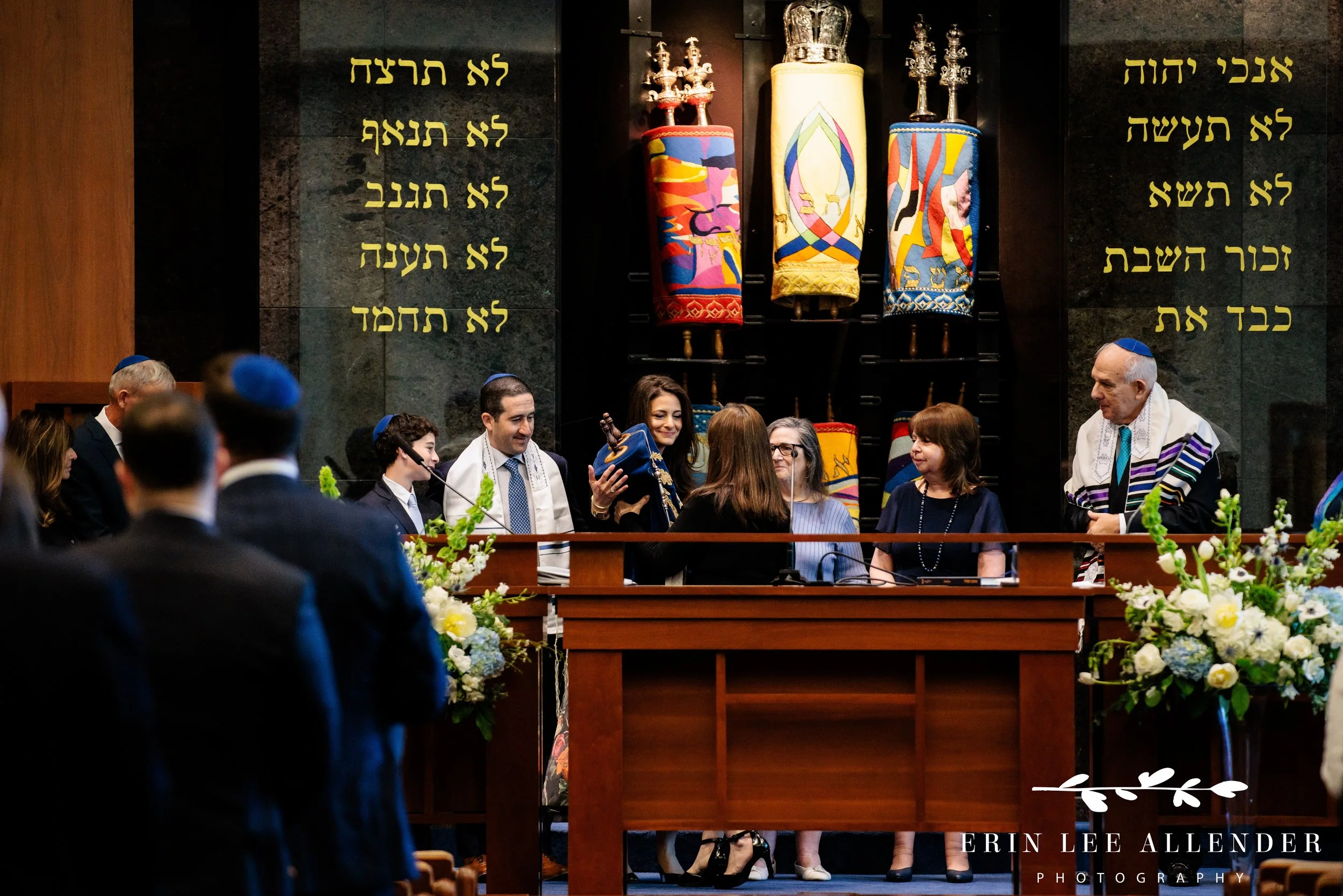 Passing the Torah during bar mitzvah service at The Temple