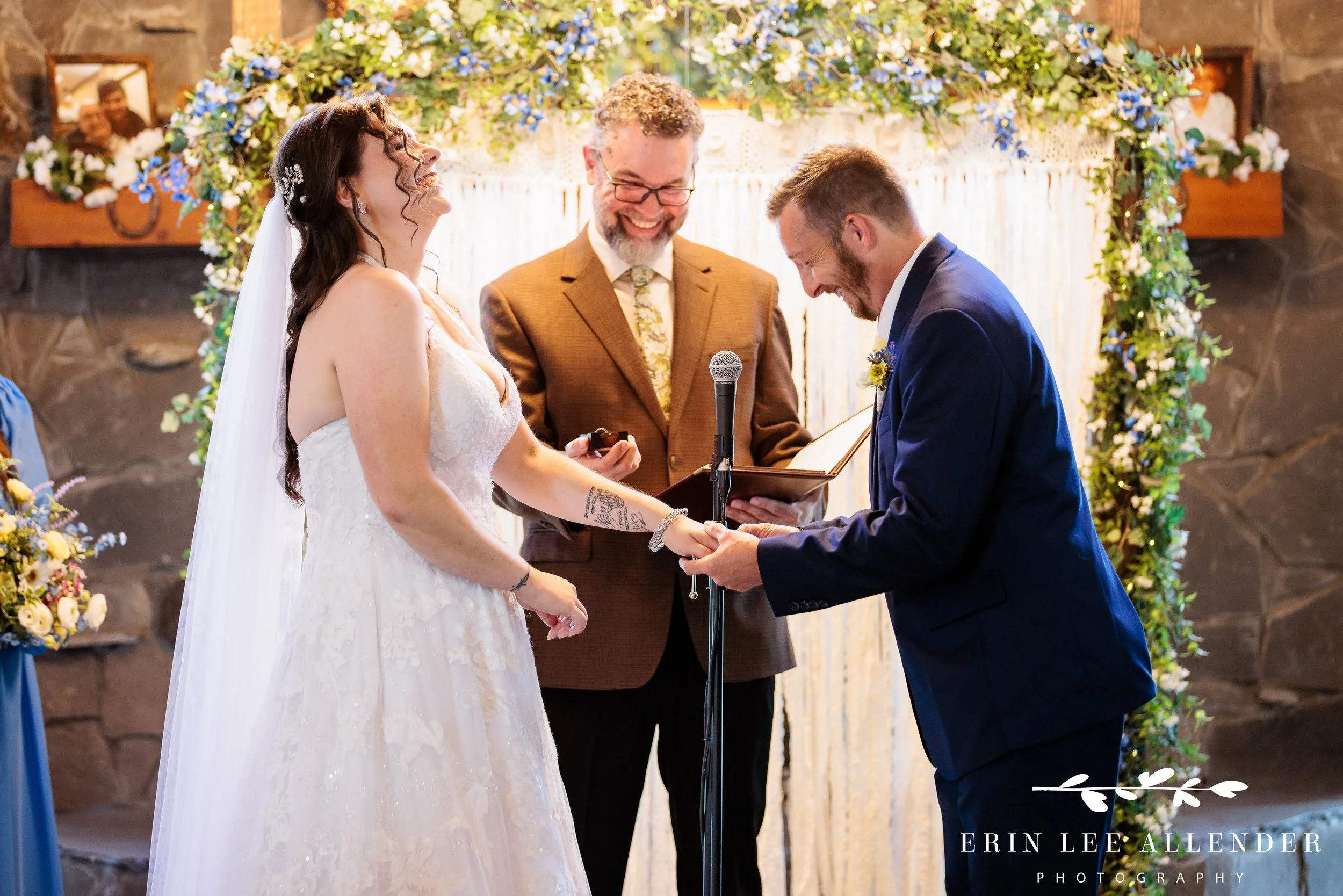 bride and groom laughing during vows.