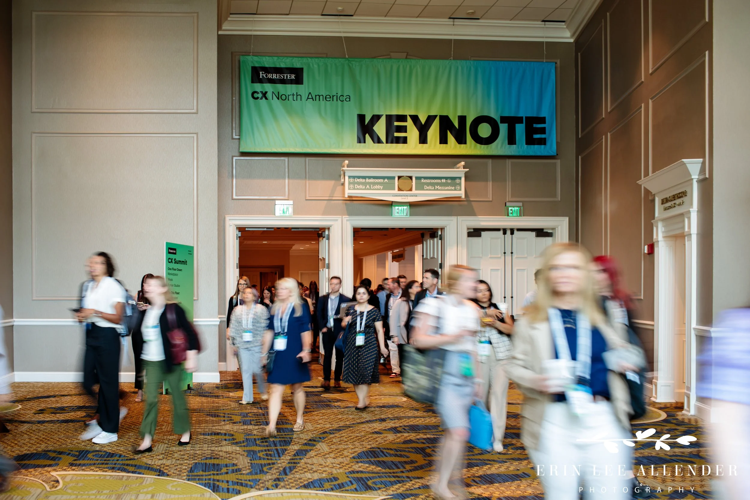 Mass exit from keynote session with motion blur at CX corporate conference Gaylord Opryland Hotel