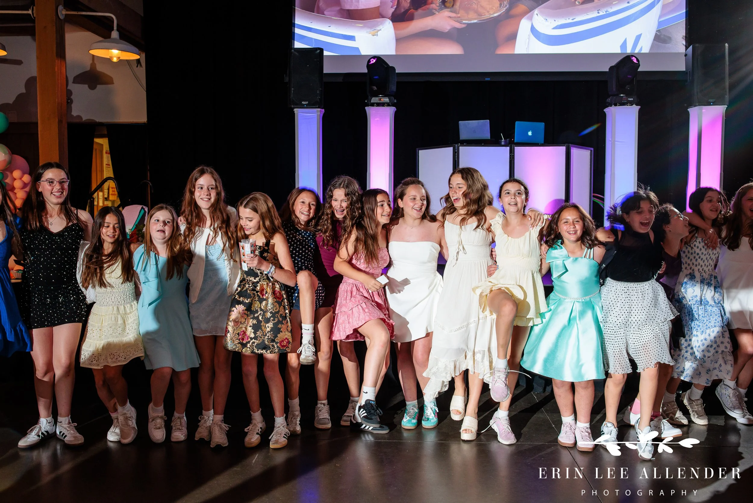 Nashville mitzvah photographer — kids doing a kickline on the dance floor at Loveless Barn Nashville