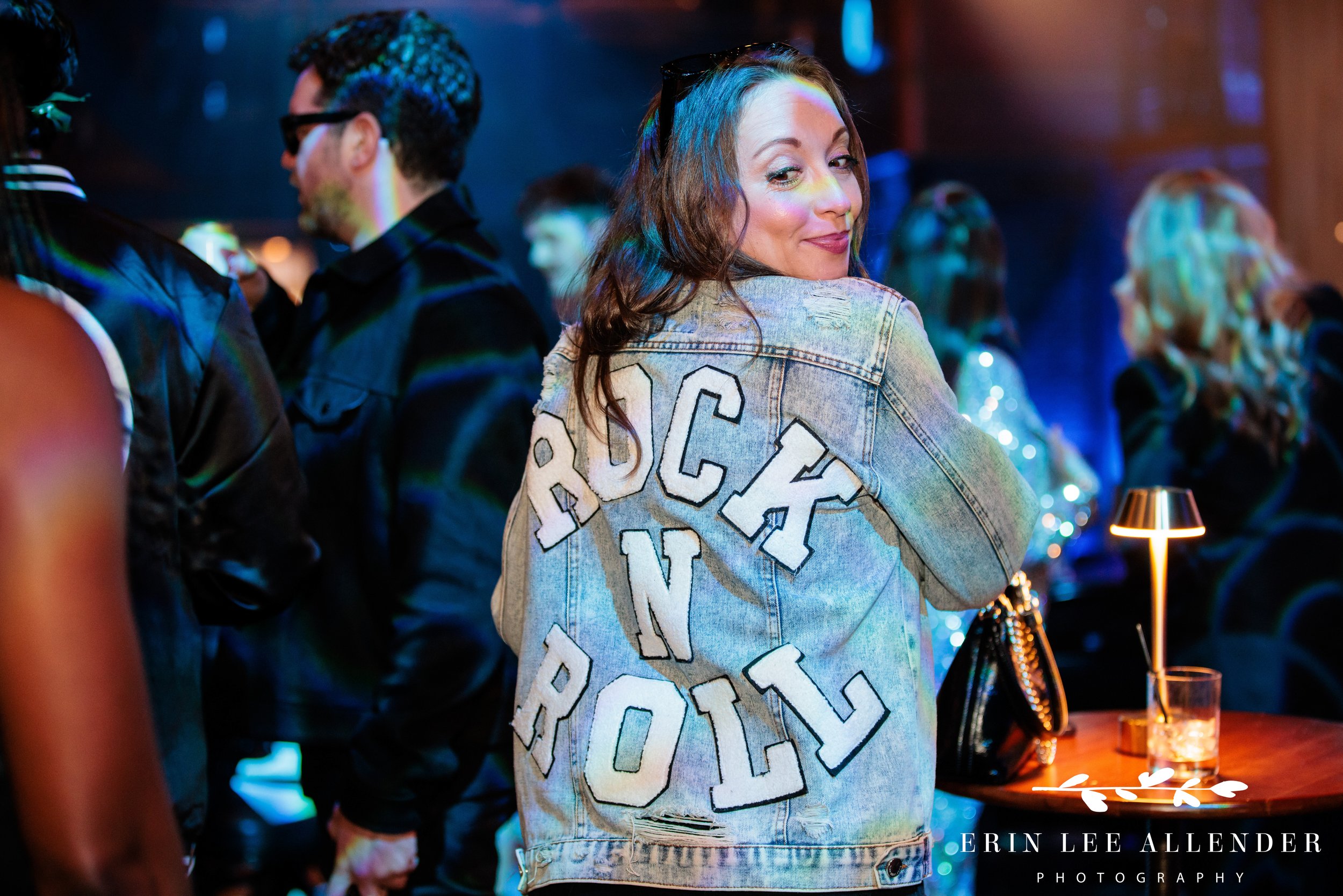 Nashville corporate event photographer — wine and spirits ambassador showing off rock n roll jacket at rockstar-chic advocacy awards, Woolworth Theatre Nashville