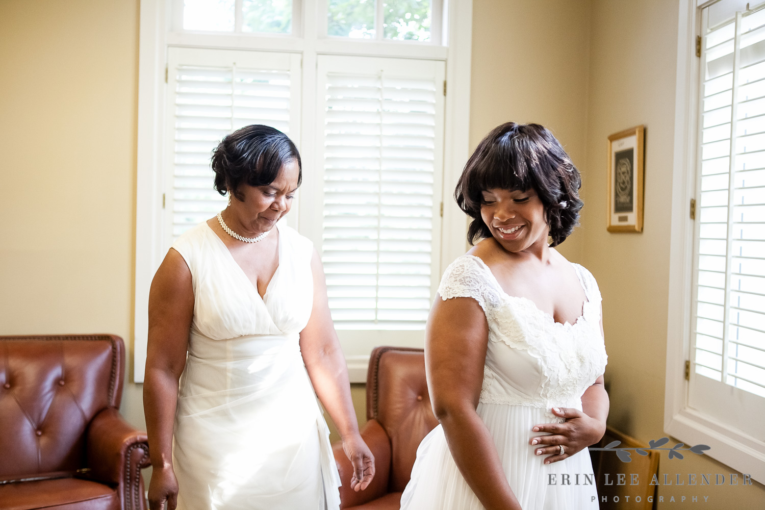 Mother_Helps_Bride_Into_Wedding_Dress