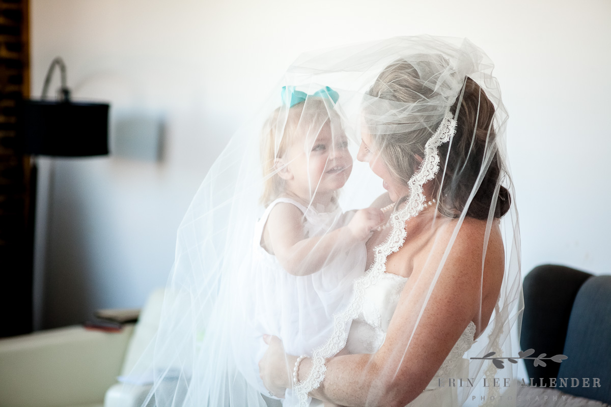Flower_Girl_Plays_With_Brides_Veil