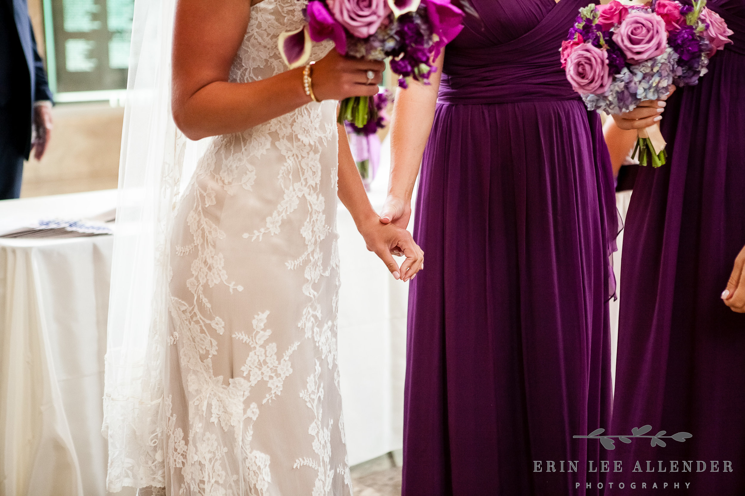 Bride_Squeezes_Maid_Of_Honors_Hand