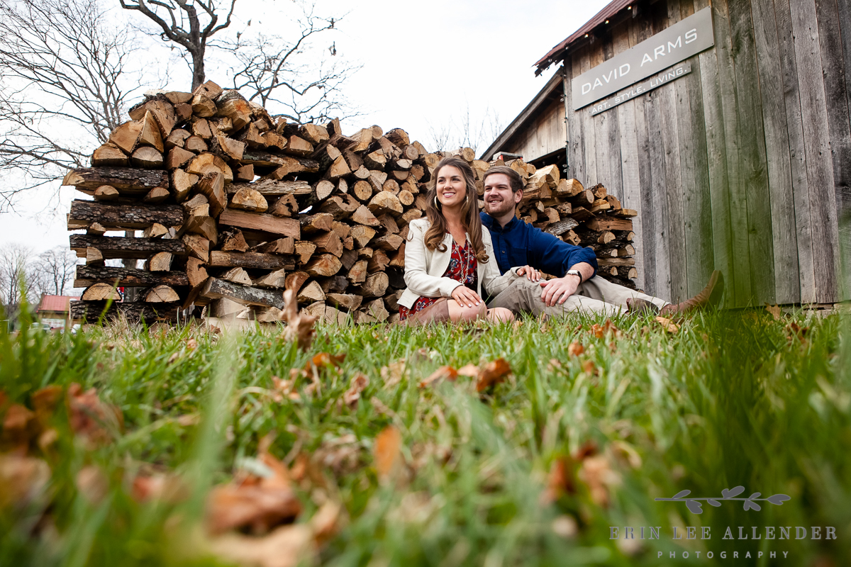 Couple_Sitting_By_Wood_Pile