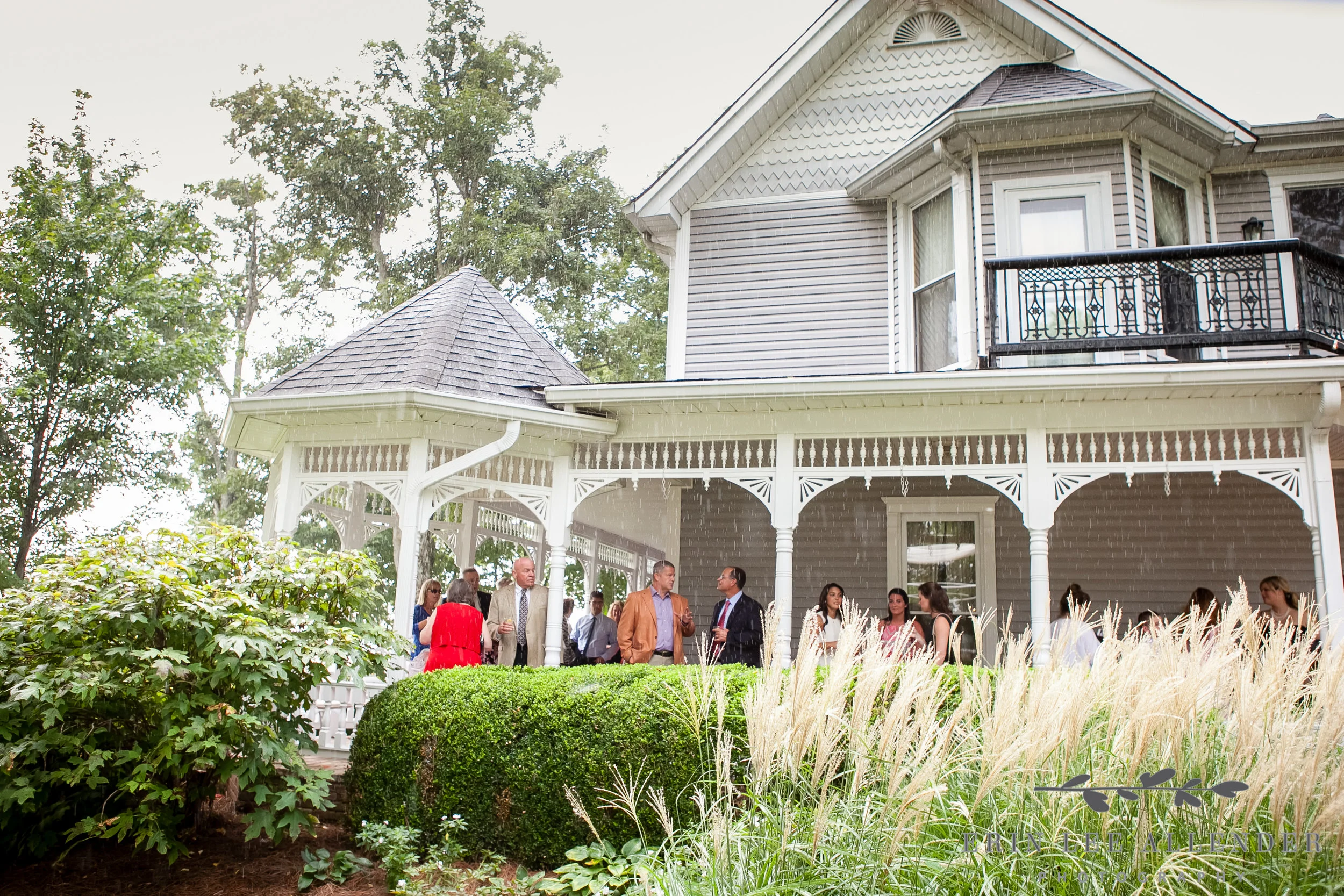 Guests_Wait_Out_Rain_On_Front_Porch