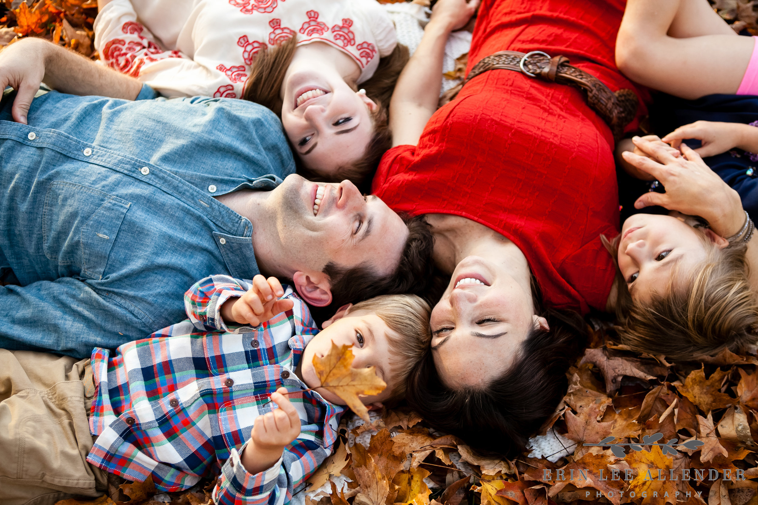 Family_Laying_In_Leaves