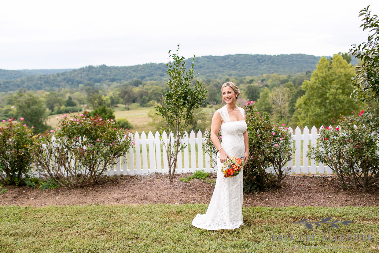 Bride_In_Front_Of_White_Picket_Fence